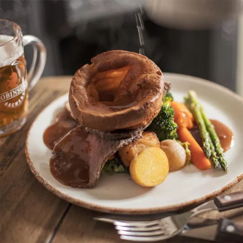 A Sunday roast with Yorkshire pudding, roast potato and vegetable